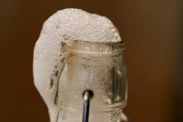kombucha, fermented drink, foam, fermented, effervescent, bottle, healthy, bubbly, drink, ferment. Reading a home fermentation by its bubbles, smell, and the moment to stop
